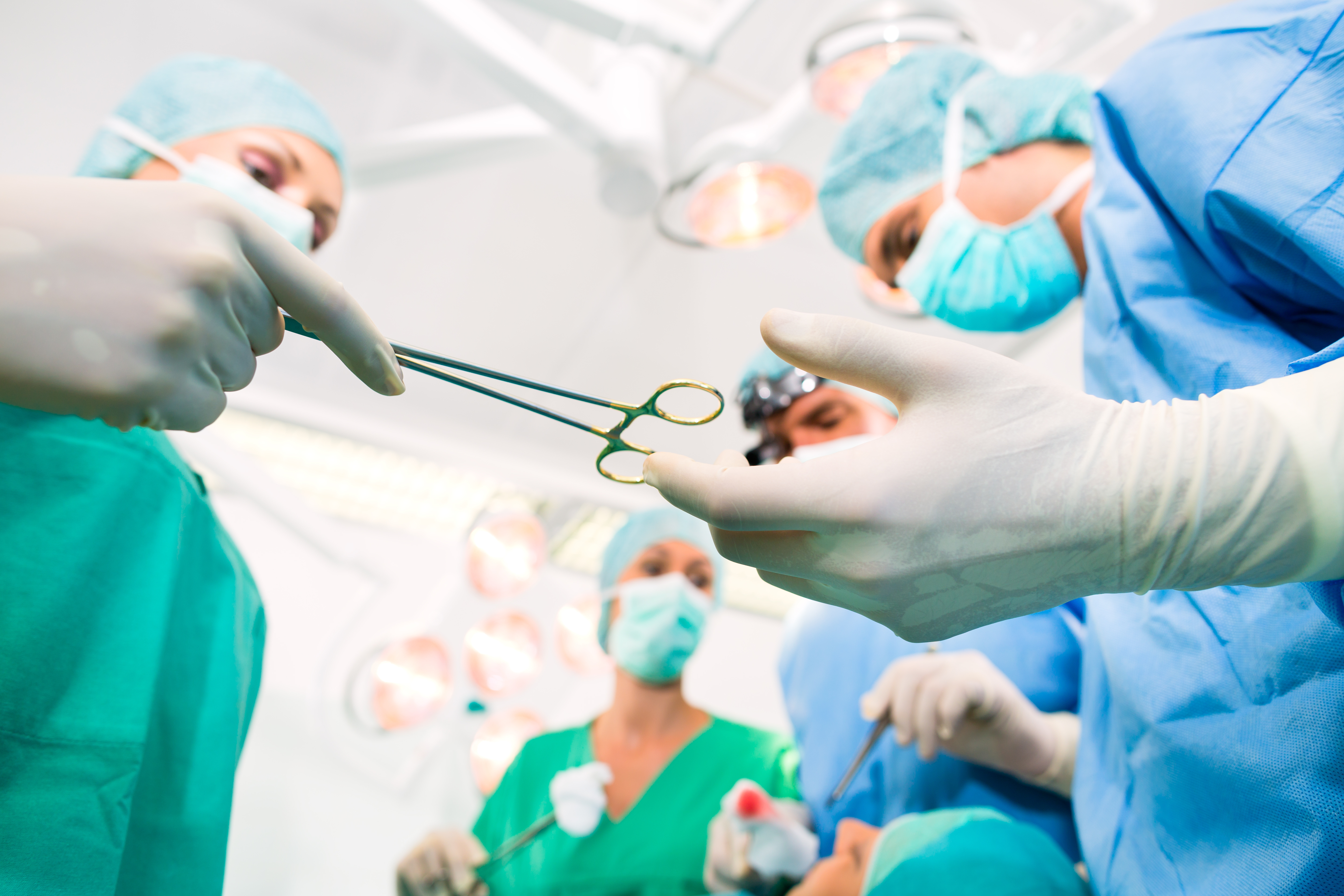 Surgeons in operating room in emergency